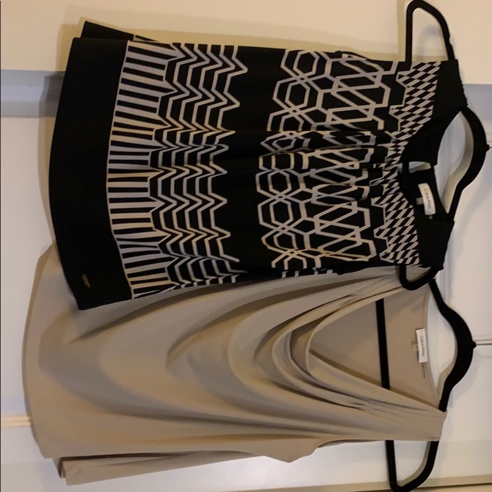 2 sleeveless blouses
